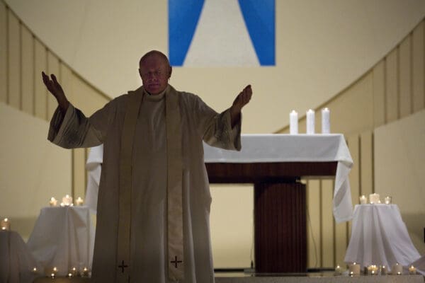 Lisa Johnston | lisa@aeternus.com | Tiwtter: @aeternusphoto  Pastor at Blessed Teresa of Calcutta, Father Robert Rosebrough raised his hands as he led those at a Life Teen mission at the church in prayer. A day of healing and prayer was held in Ferguson centering on the desire for peace and understanding after recent turmoil surrounding the events of the shooting of 18-year-old Michael Brown on Aug. 9, 2014.  The rosary and Divine Mercy Chaplet were prayed in Wabash Park by about 100 and later some 275 were a part of a LifeTeen XLT (stands for Exalt) at Blessed Teresa of Calcutta Parish.  The event will featured Catholic musician Ike Ndolo and Emily Wilson.